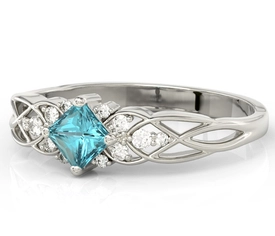 Pierścionek z białego złota z topazem Swarovski Ice Blue i diamentami BP-86B